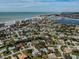 Scenic aerial shot showcasing a home's prime location near the beach, intercoastal, and the broader neighborhood at 705 Armada N Rd, Venice, FL 34285