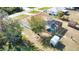 House with pool and shed, seen from above at 7148 Totem Ave, North Port, FL 34291
