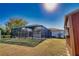 Screened-in pool and patio area in a spacious backyard at 7148 Totem Ave, North Port, FL 34291