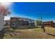 Screened pool and patio, visible from the expansive backyard at 7148 Totem Ave, North Port, FL 34291