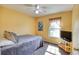 Cozy bedroom featuring a queen bed and a window with natural light at 7148 Totem Ave, North Port, FL 34291