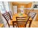 Kitchen with wooden cabinets and a view to the backyard at 7148 Totem Ave, North Port, FL 34291