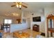 Open living space with hardwood floors and a view into the kitchen at 7148 Totem Ave, North Port, FL 34291