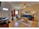 Bright living room with hardwood floors and plenty of natural light at 7148 Totem Ave, North Port, FL 34291