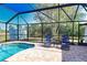 Enjoy this relaxing screened-in pool and patio area, perfect for outdoor entertaining at 7148 Totem Ave, North Port, FL 34291