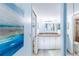 Bathroom with granite countertop and white cabinets at 832 Bird Bay Way # 113, Venice, FL 34285