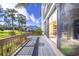 Private deck with sliding doors leading to living area at 832 Bird Bay Way # 113, Venice, FL 34285