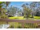 Enjoy a relaxing pool view from your deck at 832 Bird Bay Way # 113, Venice, FL 34285