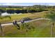 Aerial view of golf course with two golf carts at 9019 Stone Harbour Loop, Bradenton, FL 34212