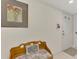 Bright condo entryway with bench and decor at 934 Capri Isles Blvd # 111, Venice, FL 34292