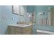 Bright bathroom with updated vanity and fixtures at 1009 Harbor Town Dr, Venice, FL 34292