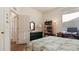 Bedroom with access to hallway and desk area at 1009 Harbor Town Dr, Venice, FL 34292