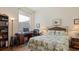 Bright bedroom with built-in desk and bookcase at 1009 Harbor Town Dr, Venice, FL 34292