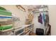 Organized closet with shelving and storage containers at 1009 Harbor Town Dr, Venice, FL 34292