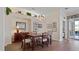 Charming dining room with hardwood floors and a chandelier at 1009 Harbor Town Dr, Venice, FL 34292