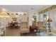 Spacious living area with ample natural light and comfy armchairs at 1009 Harbor Town Dr, Venice, FL 34292