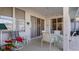 Covered patio with seating area and access to pool at 1009 Harbor Town Dr, Venice, FL 34292