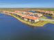Luxury community with lakefront homes and lush landscaping at 10217 Staggerbush Dr # 202, Venice, FL 34293