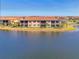 Luxury community with lakefront homes and lush landscaping at 10217 Staggerbush Dr # 202, Venice, FL 34293