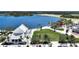 Aerial view of Wellen Park, featuring a lake and community center at 10217 Staggerbush Dr # 202, Venice, FL 34293