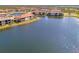 Luxury community with lakefront homes and lush landscaping at 10217 Staggerbush Dr # 202, Venice, FL 34293