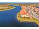 Luxury community with lakefront homes and lush landscaping at 10217 Staggerbush Dr # 202, Venice, FL 34293