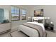 Spacious bedroom with a king-size bed and nice view at 10217 Staggerbush Dr # 202, Venice, FL 34293