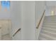 Second floor landing; view of the entryway and staircase at 10217 Staggerbush Dr # 202, Venice, FL 34293