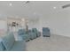 Open living area showcasing a kitchen and seating area at 10217 Staggerbush Dr # 202, Venice, FL 34293