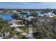 Aerial view showing a house's location on a waterfront lot at 107 Louella Ln, Nokomis, FL 34275