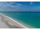 Expansive beach with white sand and clear water at 107 Louella Ln, Nokomis, FL 34275