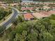 Community view showcasing a house with a tile roof at 11601 Parrotfish St, Venice, FL 34292