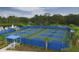 Well-maintained pickleball courts near a lake at 11678 Aucilla Dr, Venice, FL 34293