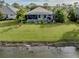 Single-Gathering home with pool and backyard on canal at 12198 Wakulla Pl, Venice, FL 34293