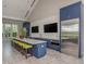 Community kitchen with island and blue cabinets at 12198 Wakulla Pl, Venice, FL 34293