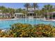 Relaxing pool area with cabanas and landscaping at 12198 Wakulla Pl, Venice, FL 34293