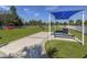 Dog park with grassy area, agility equipment, and shaded seating at 12198 Wakulla Pl, Venice, FL 34293