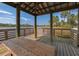 Covered pavilion overlooking a serene lake at 12198 Wakulla Pl, Venice, FL 34293