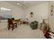 Bright office space with desk, chair, and comfortable seating area at 12198 Wakulla Pl, Venice, FL 34293