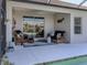 Relaxing patio with wicker furniture and view of the pool at 12198 Wakulla Pl, Venice, FL 34293
