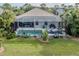 Spacious pool and patio area with screened enclosure at 12198 Wakulla Pl, Venice, FL 34293