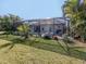 Relaxing pool area with lush landscaping and screened enclosure at 12198 Wakulla Pl, Venice, FL 34293