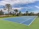Newly resurfaced tennis court in a gated community at 12198 Wakulla Pl, Venice, FL 34293