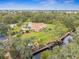Community clubhouse, pool, and waterway with kayaks at 1236 Pinebrook Way, Venice, FL 34285
