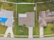 Top-down view showcasing a single-story house and surrounding homes at 1236 Pinebrook Way, Venice, FL 34285
