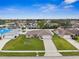 Bird's-eye view of a single-story house and neighborhood at 1236 Pinebrook Way, Venice, FL 34285