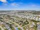 Aerial view of community with various homes and landscape at 1236 Pinebrook Way, Venice, FL 34285