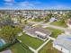 Aerial view of house, yard, and neighborhood at 1236 Pinebrook Way, Venice, FL 34285