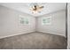 Bright bedroom with ceiling fan and window shutters at 1236 Pinebrook Way, Venice, FL 34285