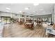 Bright and airy community room with seating at 1236 Pinebrook Way, Venice, FL 34285